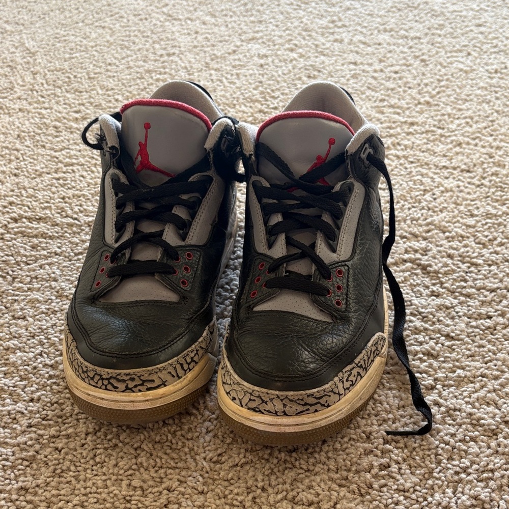Jordan Black and Gray Sneakers with Red Highlights